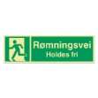 Skilt for nødutgang: Rømningsvei holdes fri. Skiltet viser plassering av nærmeste rømningsvei, og informerer beboere og andre om at rømningsveien må holdes fri og ikke blokkeres.
